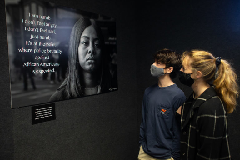 Members and guests of Orange County&rsquo;s MLK Initiative view the Uprooting Prejudice exhibit at the Holocaust Memorial Resource &amp; Education Center of Central Florida.