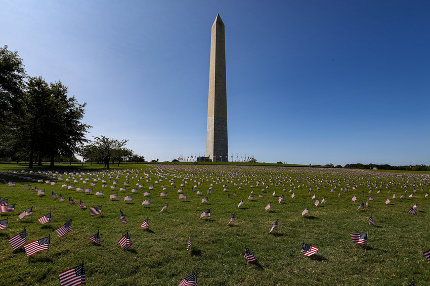 20,000 american flags placed on the lawns of the Washington Monument.