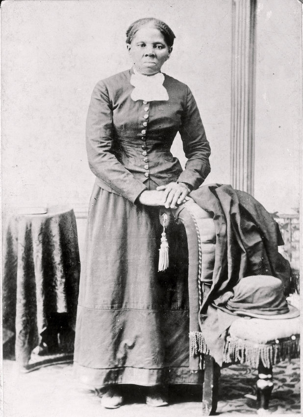 Harriet Tubman poses for a picture taking in the 19th century.