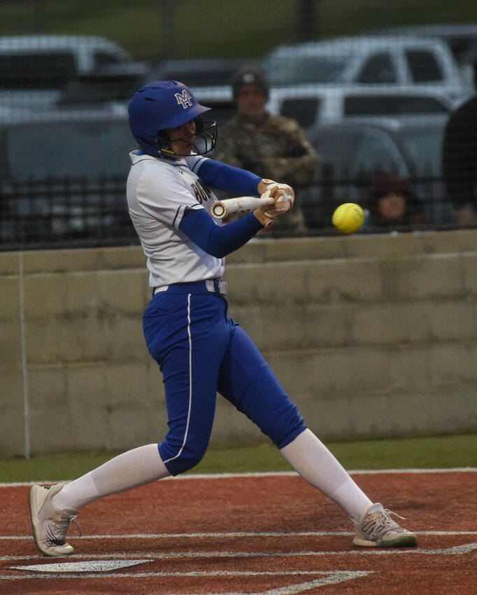 Mountain Home's Daelyn Harper connects for a hit against Harrison on Tuesday. Harper went 4-for-7 with seven RBIs in a doubleheader sweep of the Lady Goblins.