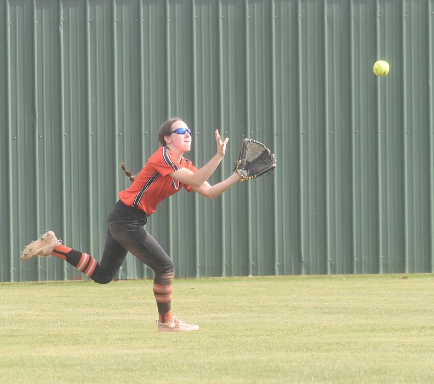 Viola's Audrey Newberry makes a running catch in center field against Shirley on Wednesday.