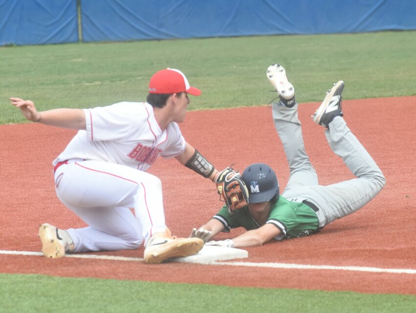 Flippin's Isaiah Wood tags Valley Springs' Rylan Ballard in the 3A-1 District semifinals on Saturday at McClain Park.
