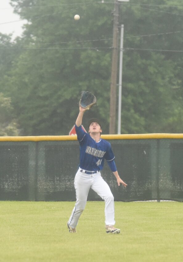 Cotter's Will Morris catches a fly ball in center field on Thursday in the 2A West Regional at Lavaca.