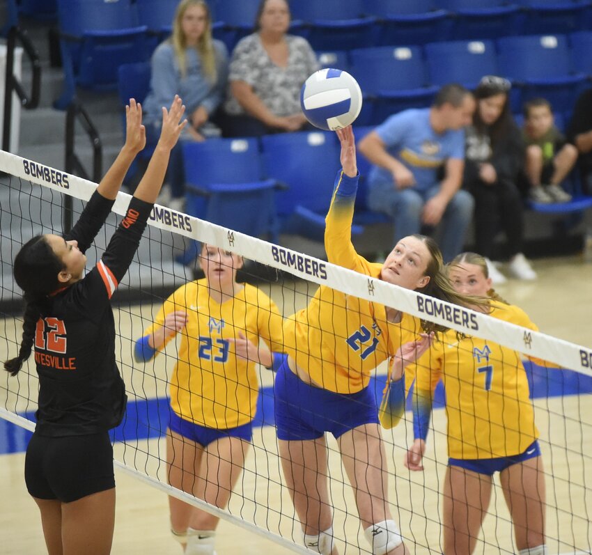 Mountain Home's Anna McCarn hits during a recent match against Batesville.