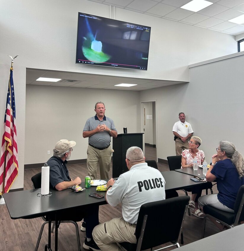 Mountain Home Mayor Hillrey Adams speaks to officials and attendees for the new Mountain Home Police Department located at 650 South St. in the heart of the city.


Caroline Spears/The Baxter Bulletin