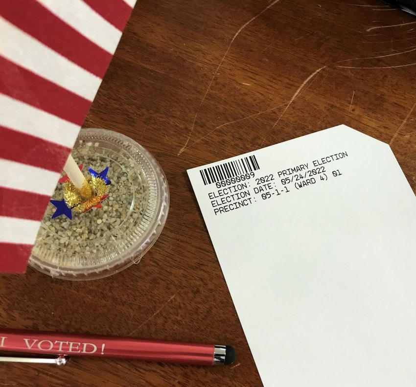 A voter's unmarked ballot is seen on a table at the Baxter County Election Commission's Mountain Home office during early voting for the May 24 primary election. About 30 percent of the county's registered voters participated in the election.