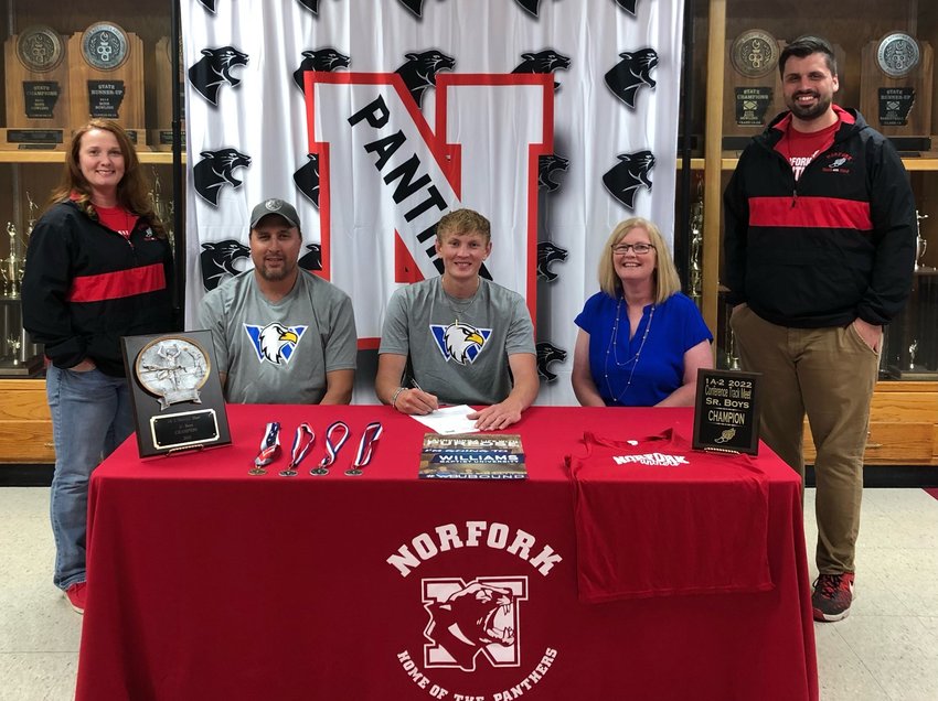 Norfork's Will Martin signed a National Letter of Intent last week to compete in track and field at Williams Baptist University in Walnut Ridge. Pictured are: (from left) Norfork track coach Stacy Havner, Richard Martin, Will Martin, Leanna Martin, and Norfork track coach Bradley Morrison. Martin was part of Norfork's 1A-2 Conference championship boys' team. He placed in the top five in high jump, long jump, triple jump and shot put at the district meet.