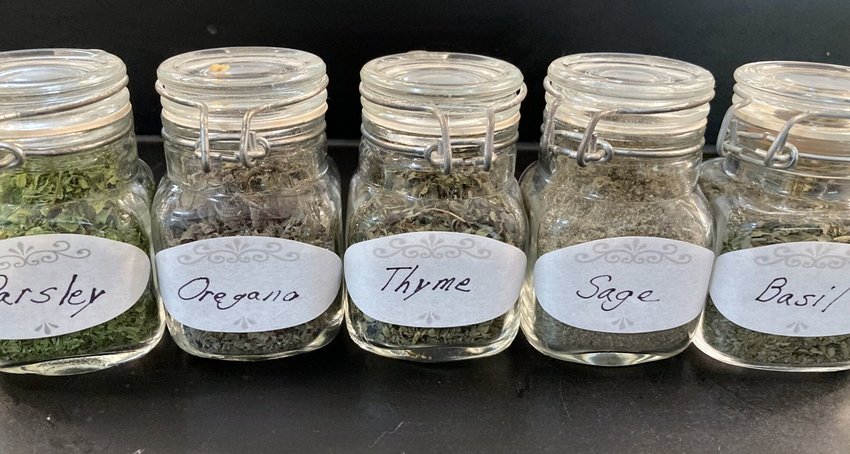 Fresh from the garden of Chandra Huston of Western Grove, these herbs are dried and bottled for winter use.   Linda Masters/The Baxter Bulletin