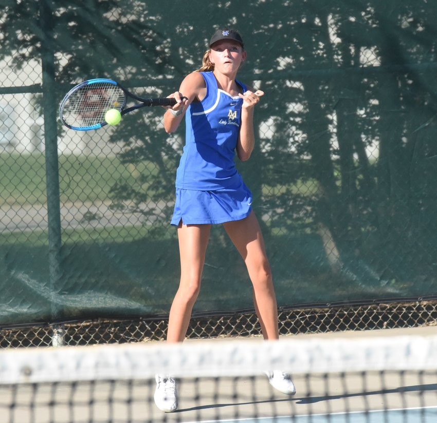 Mountain Home's Hannah Baker returns a shot during a recent home match. The Lady Bombers placed third at the Class 5A State tournament on Tuesday.