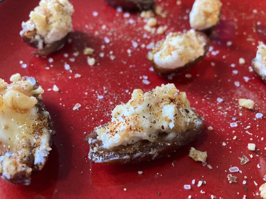 Sweet and sticky dates pair well with goat cheese, walnuts and honey to make a delicious appetizer or snack.   Linda Masters/The Baxter Bulletin