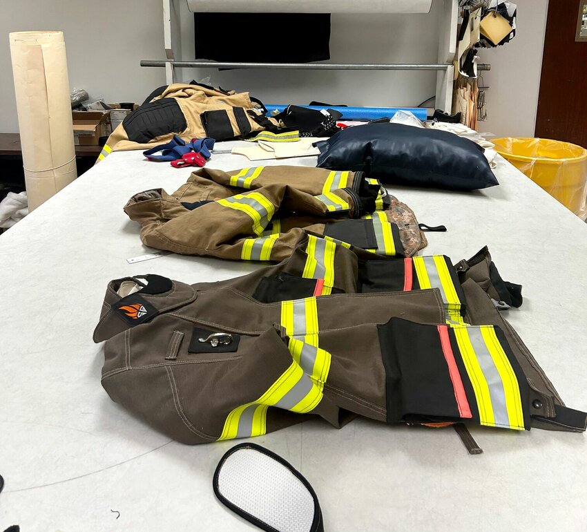 Turnout gear for fire fighters is one of American Stitchco's newest product lines. The company has a goal of clothing 100 firefighters per day, according to Vice President Ben Luelf.   Caroline Spears/The Baxter Bulletin