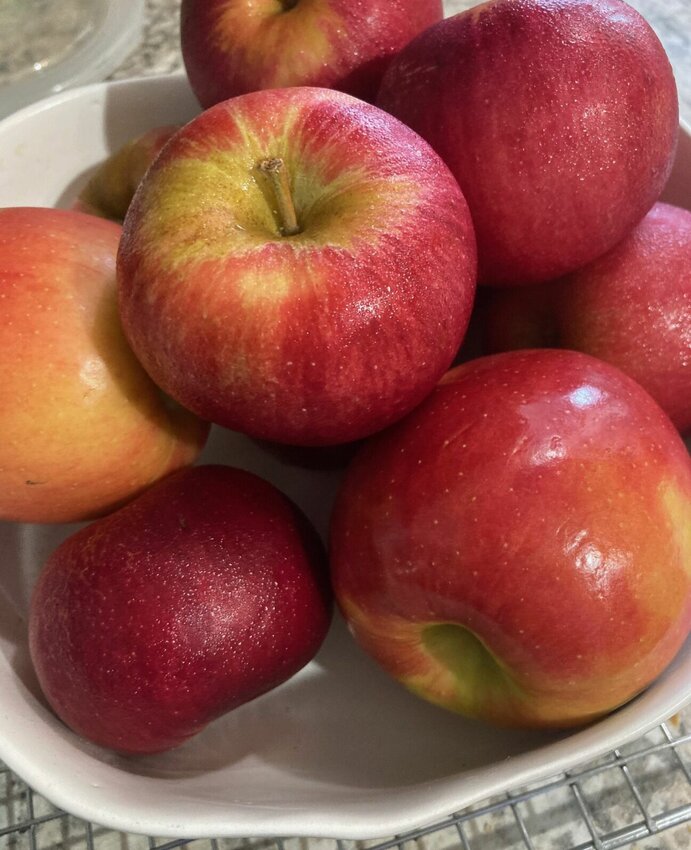 Jonathan and Honey Crisp apples (shown) are two apples available locally that are perfect for making pies and crisps.   Linda Masters/Baxter Bulletin