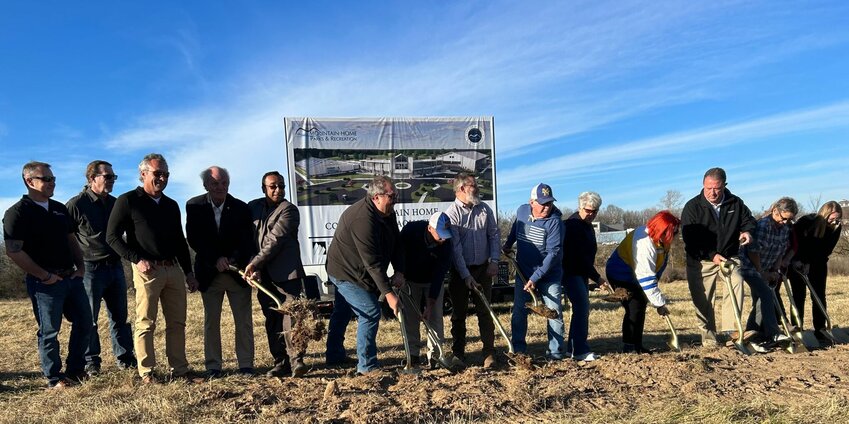 Area dignitaries joined Mountain Home Mayor Hillrey Adams (second from right) during a groundbreaking ceremony Thursday for the new Mountain Home Aquatic &amp;amp; Community Center at McCabe Park.   Caroline Spears/The Baxter Bulletin