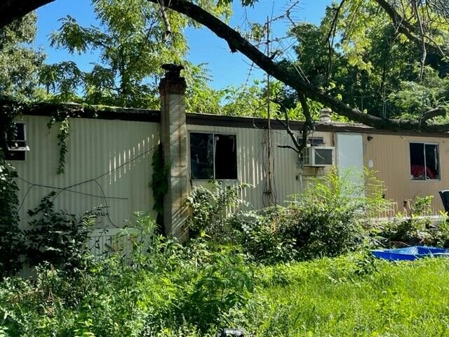 The City of Mountain Home filed a lien against the owner of this property on Rossi Road to recover just over $9,000 in expenses incurred to clean up the nuisance property.   Photo Courtesy of the City of Mountain Home