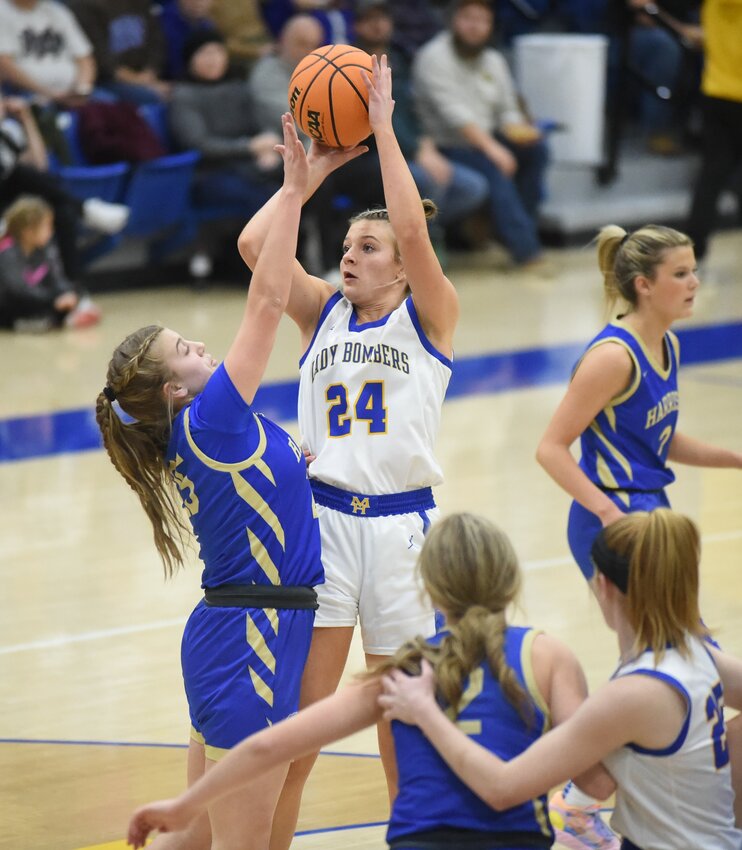 Mountain Home's Laykin Moore puts up a shot during last week's victory against Harrison.