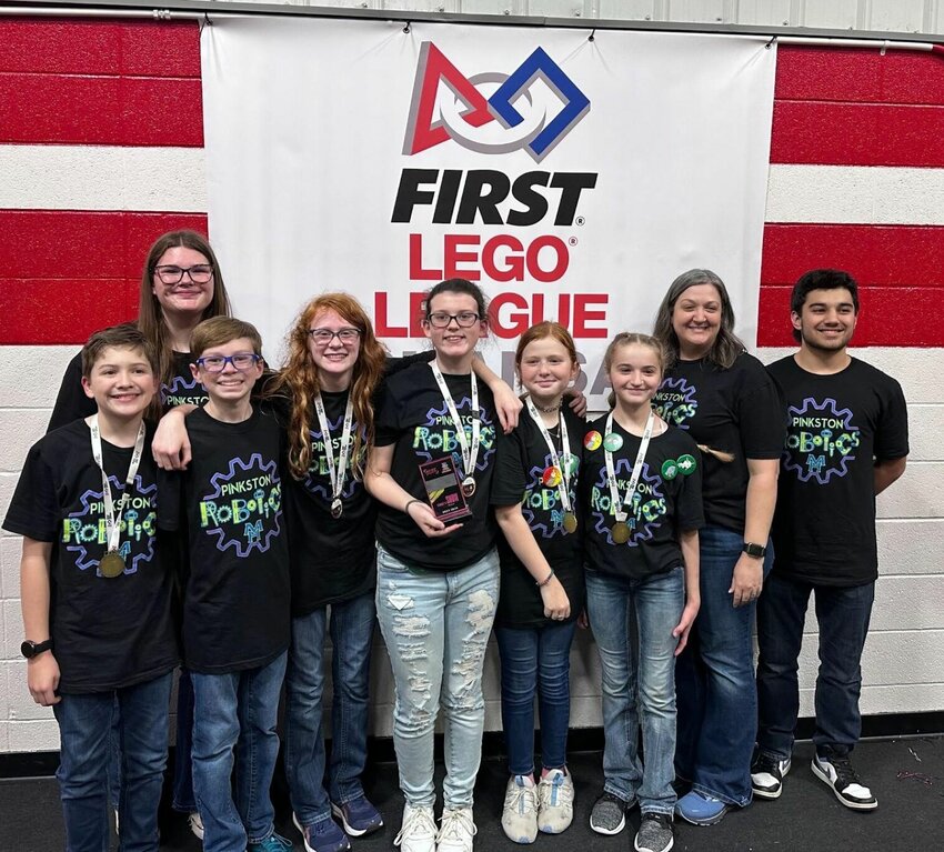 The Pinkston Robotics pose at the Regional Qualifier at Harding Academy. Shown are (from left) Crews Wooldridge, Olivia Clements, Brooks Barber, Bray-Lynn Hopper, Allison Free, Abi Hale, Ava, Chrissy Davis and Noah Dickerson.   Submitted Photo