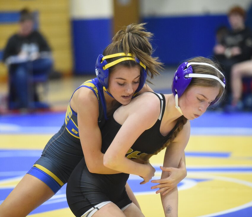 Mountain Home's Kenzi Clark wrestles during a recent home match. The Lady Bombers finished third at the 5A-North Regional tournament on Saturday, and Clark was one of seven Mountain Home qualifiers for the state tournament.