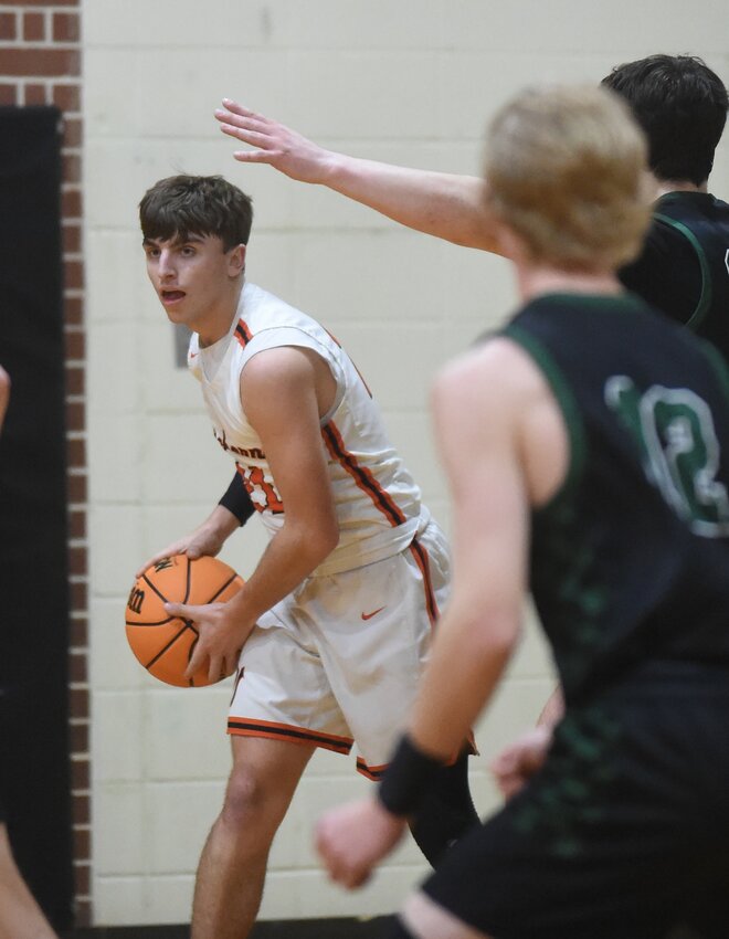 Viola's Braden Williams looks for an open teammate during a home game earlier this season against West Side.