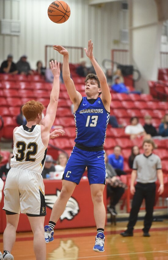 Cotter's Kolby Woods puts up a shot earlier this season at Flippin. Woods scored a season-high 29 points to lead the Warriors past Life Way Christian.