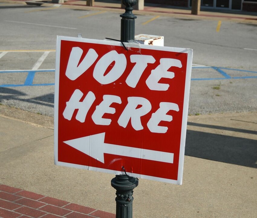 A vote here sign is seen at the Baxter County Courthouse. Early voting for the March 5 primary election is now open in Arkansas.   Bulletin File Photo