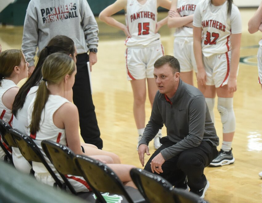 Norfork coach Luke Cornett talks to his team during a timeout at the 1A Region 2 Tournament at Greers Ferry.