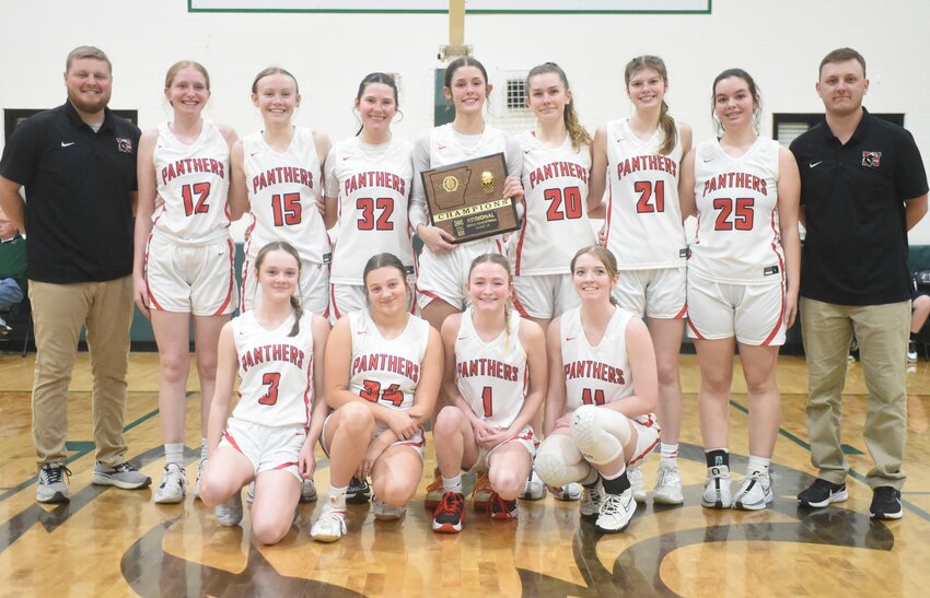 The Norfork Lady Panthers won the 1A Region 2 championship on Saturday at Greers Ferry. Members of the team are (front row, from left) Avery Davis, Marlee Shields, Hadley Acklin, Shelby Free, (back row) assistant Nolan Smith, Macie Lindsey, Cate Shaddy, Kasey Moody, Keely Blanchard, Liza Shaddy, Maggie Tyrone, Jenna Rasmussen, and head coach Luke Cornett.