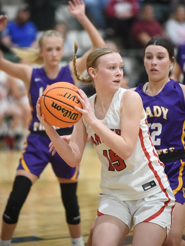 Norfork freshman Cate Shaddy looks to pass during the Lady Panthers' regional championship victory over Concord on Saturday. Norfork is back at No. 1 in Class 1A in the most recent Arkansas Sports Media poll.