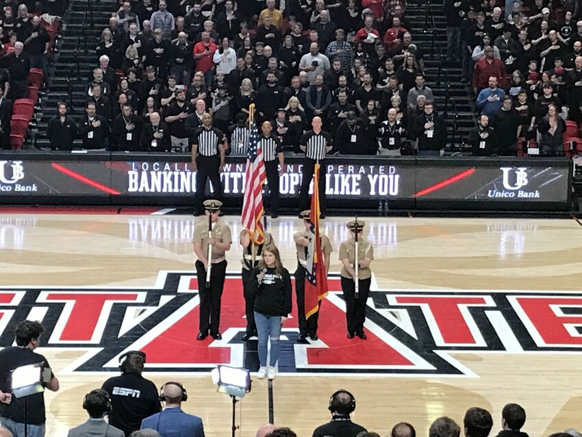 The Mountain Home Navy Junior ROTC Color Guard presents the colors at the Arkansas State University vs Troy University basketball game. Shown are (from left) are Cadet Lt. Ethan Darraq, Cadet Lt. Cmdr. Makalea Broad, Cadet Lt. Cmdr. Justin Rula and Cadet Lt. Jr. Junior Grade Rose Taylor.


Submitted Photo