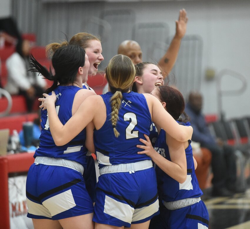 Cotter players (from left) Laney Dwyer, Kylee Chastain, Gracyn Jackson, Emma Jones and Addi Decker celebrate at the buzzer of their 63-57 state tournament victory over Parkers Chapel on Wednesday at Mansfield.