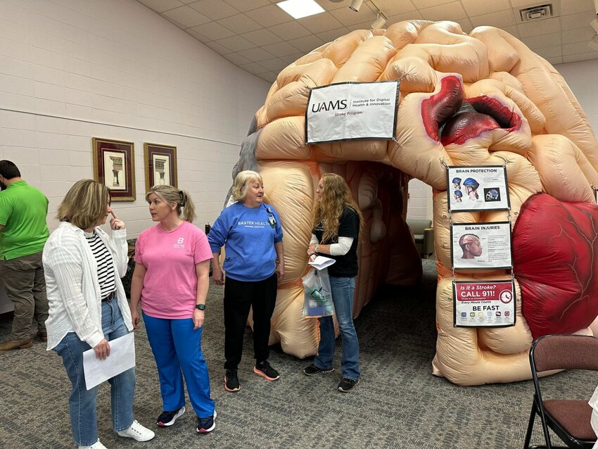 Nursing students prepare to walk through a oversized brain at the recent Ozarka College annual Student Nursing Conference.   Submitted Report