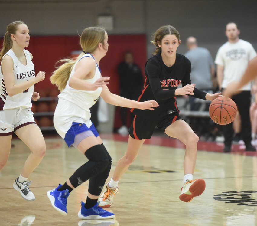Norfork's Keely Blanchard brings the ball upcourt for the East team in its 59-58 win over the West at the North Central Arkansas All-Star basketball games Monday night at Pioneer Pavilion.