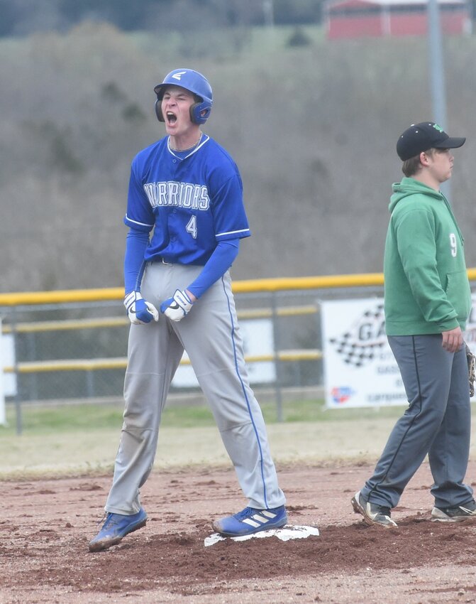 Cotter's Cole Tilton (4) celebrates an RBI double against Yellville-Summit on Tuesday at Marty Hall Field.