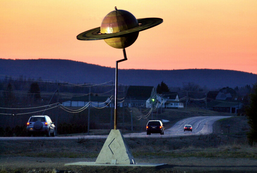A model of the planet Saturn stands near Route 1 in Westfield, Maine. The nation's largest three-dimensional scale model of the solar system is positioned along a 40-mile stretch of highway between Presque Isle, Maine, and Houlton, Maine. The April 8, 2024, total solar eclipse in North America first hits land at Mexico&rsquo;s Pacific coast, cuts diagonally across the U.S. from Texas to Maine and exits in eastern Canada.   AP File Photo