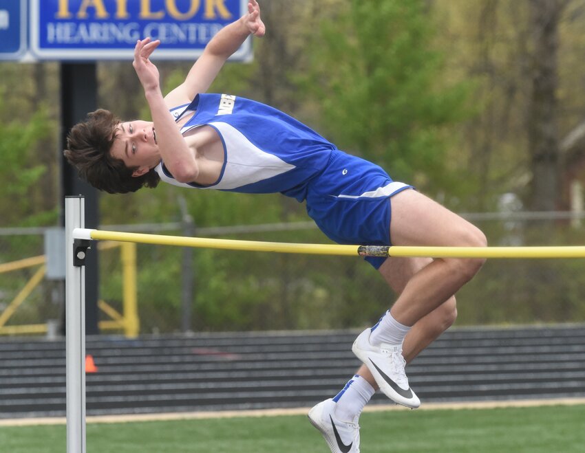 Mountain Home's Gus Wilber competes in the high jump on Monday at the Junior Bomber Relays at Bomber Stadium.