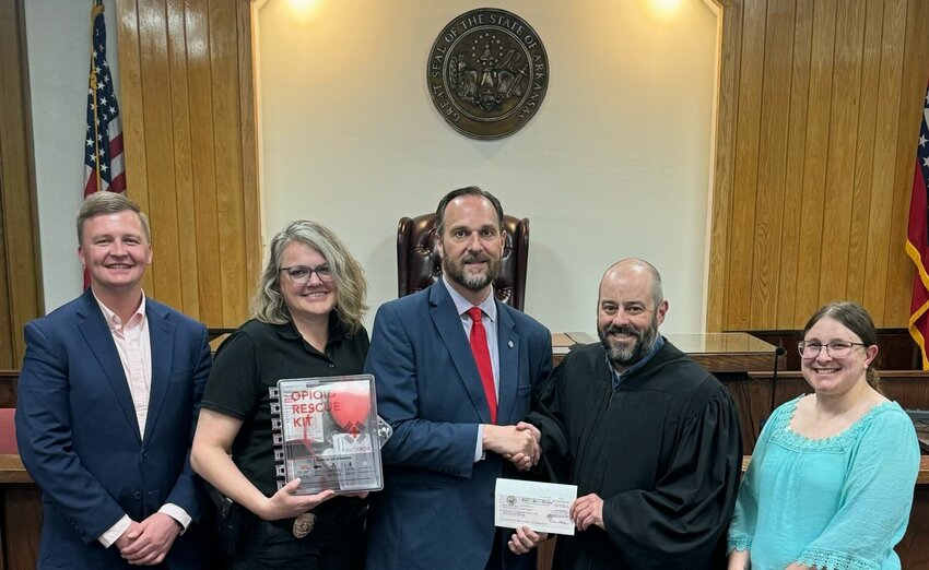 Shown receiving $28,286 and naloxone kits are (from left) Kyle Brewer, administrative office of the courts; Carla Johnson, Drug Court probation officer; Marty Sullivan, Administrative Office of the Courts director; Circuit Judge Andrew Bailey; and Brittany Hankins, Drug Court advisor.


Photo Submitted
