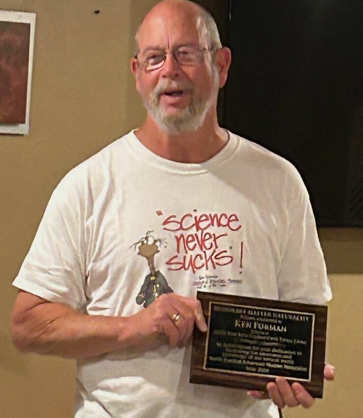 Forman is shown with his award.   Submitted Photo
