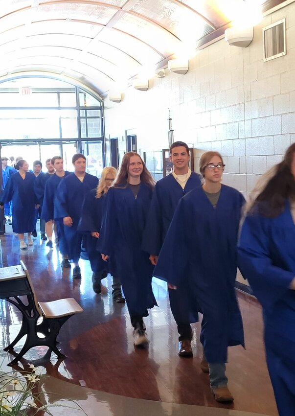 On Friday, members of the Mountain Home High School Class of 2024 participated in the long-standing Graduation Walk tradition through the halls of Hackler Intermediate School to inspire younger students.   Cole Sherwood/Baxter Bulletin