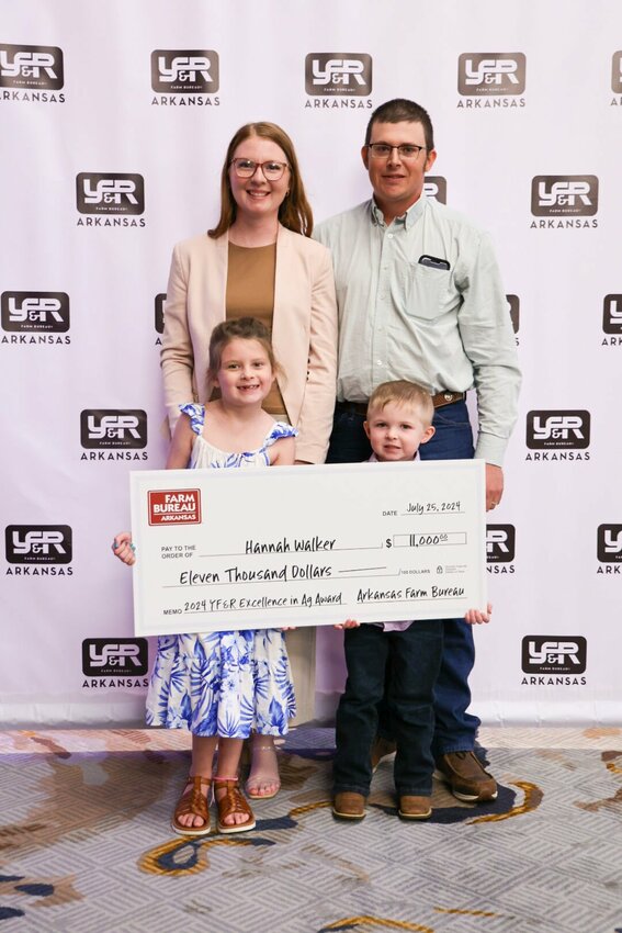 Hannah and Cody Walker's children, Claire and Charlie, display the $11,000 check Hannah won as part of the Farm Bureau Young Farmers & Ranchers Award. The Walkers run a cow-calf operation near Mountain Home and on the weekends operate County Line Beef, LLC, a direct-to-consumer beef operation.


Submitted Photo