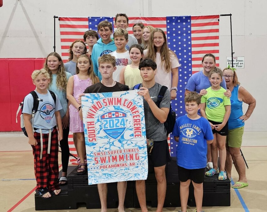 The Mountain Home Hurricanes won the small team division at the South Wind Conference championship swim meet on July 27 in Pocahontas.