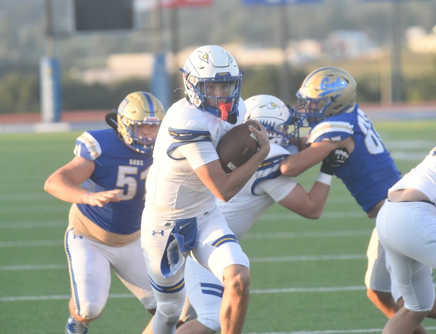 Mountain Home's Brantlee Phillips races to the end zone against Harrison.