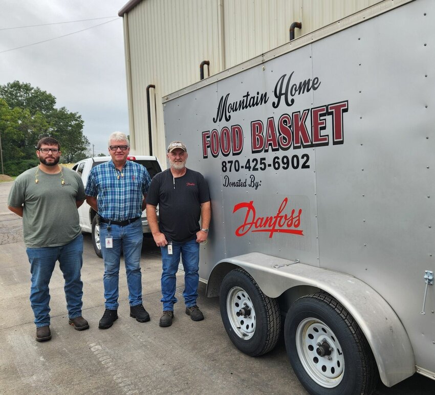 Danfoss Power Solution's leadership and employees recently provided 1,354 pounds of food for the Mountain Home Food Basket, Dan Foss employees, including (from left) James Crowder, Mike Rotenberry and Billy Chandler, generously gave non-perishable food items at the company picnic to help meet the needs in the community. For the year, MHFB averages 70 new households per month. To sponsor a food drive or volunteer, call Cheryl Newman at (402) 681-8725.


Submitted Photo