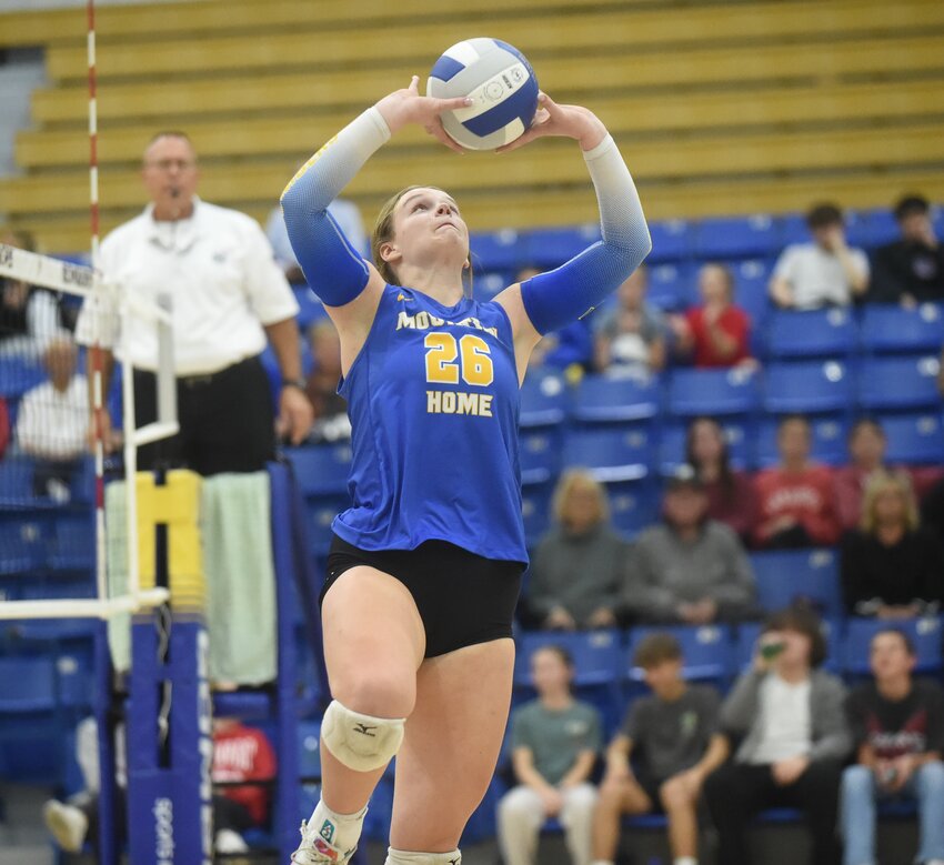 Mountain Home's Micayla Magis sets during the Lady Bombers' sweep of Searcy on Thursday at The Hangar.