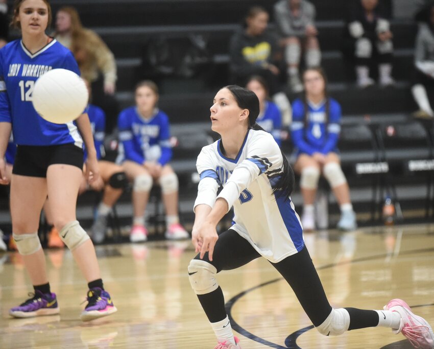 Cotter's Addison Decker passes during district tournament action against Izard County on Tuesday. The Lady Warriors fell to undefeated Marshall in Thursday's championship match.