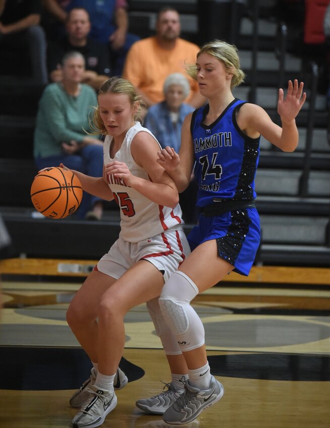 Norfork's Cate Shaddy drives baseline during a home game earlier this season.