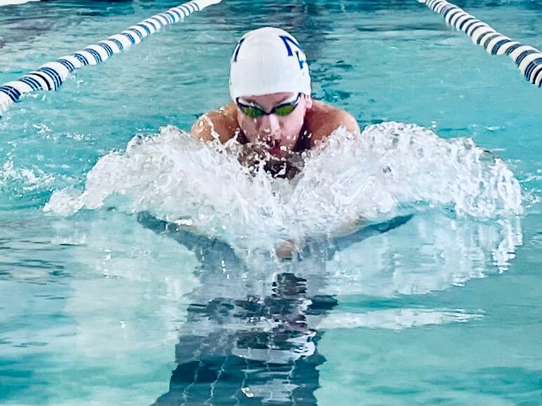 Mountain Home's Caleb Due competes in a breaststroke event earlier this season.