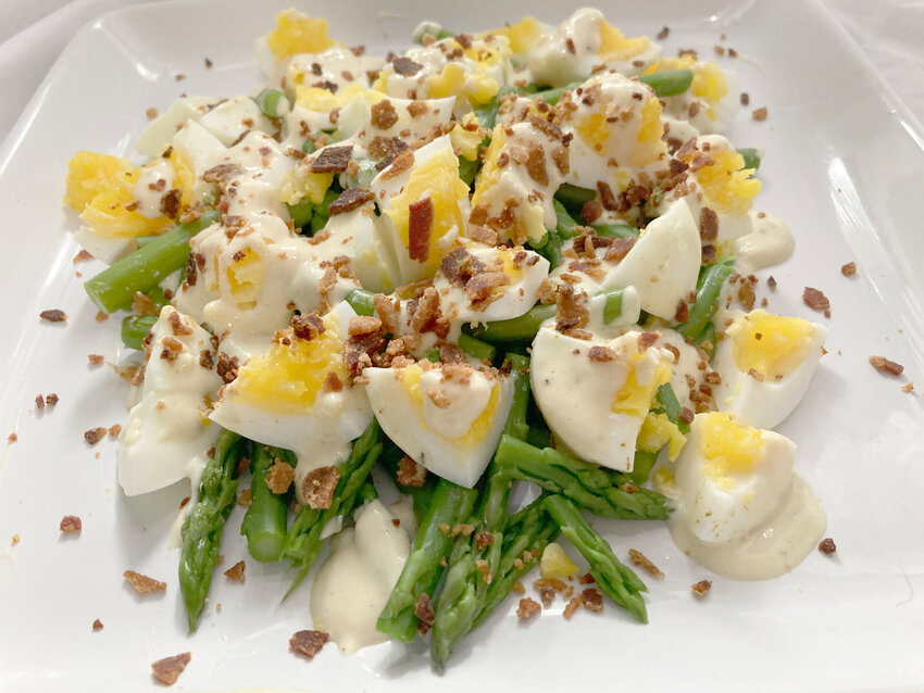 Fresh asparagus and teams up with hard-cooked eggs for this tasty spring salad.