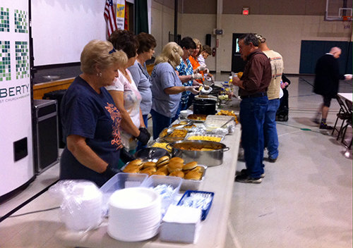 Volunteers from one of Liberty Baptist’s Sunday School classes provide food at a recent Celebrate Recovery meeting. The perception of CR being a localized ministry is the wrong one, says Pastor Brian Branam, as its impact can be felt throughout the church. LIBERTY BAPTIST/SPECIAL