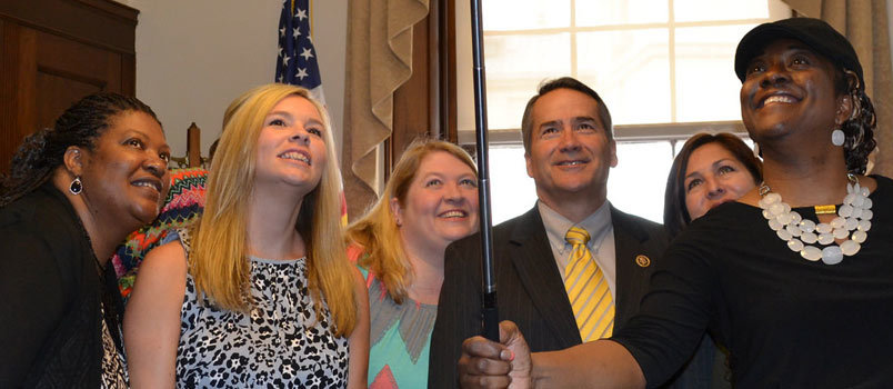A group of teachers from Morgan County use a selfie stick to pose for a photo with Congressman Hice while in Washington. Flickr.com/photos/congressmanhice