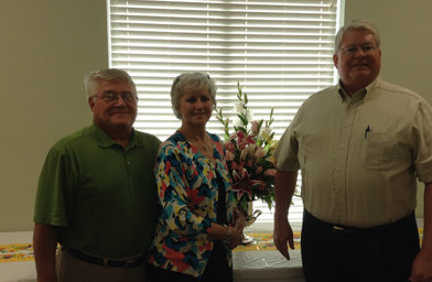 On July 26 Bellevue Baptist Church in Macon celebrated Jan Toney’s 30th anniversary as church accompanist. She is pictured with her husband, Joe, left, who is also a deacon at the church, and Minister of Music Harry Graves, right.