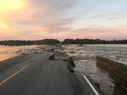 Floodwaters tear away part of highway 301 between the South Carolina towns of Manning and Turbeville, southeast of Columbia. HEATHER FAIRCHILD/Special